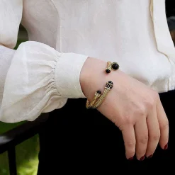 Halcyon Days Torque Bangles*Hammered Torque Black & Gold Bangle |