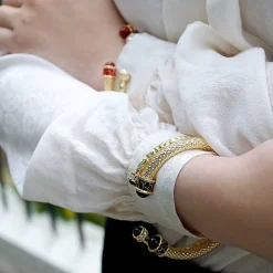 Halcyon Days Torque Bangles*Hammered Torque Black & Gold Bangle |